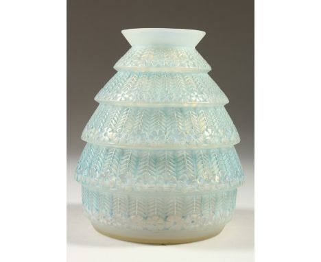 A LALIQUE BLUE TINTED VASE "FERRIERES". Etched R. Lalique, France.  No. 1019.  17cm high.