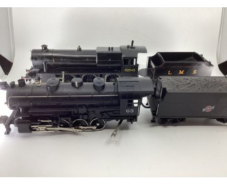 Black 5 Loco 42945 as and a further loco LMS in black both O gauge , and a together with an MTH electric black 65 Loco and te
