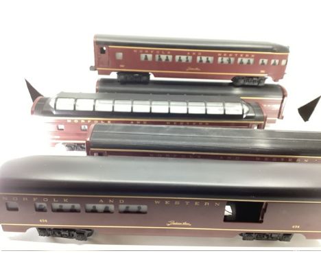 Lionel O gauge model railway carriages including passenger North and western livery in dark maroon and black-selection. ( sel