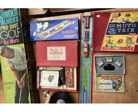 Vintage Toy and novelty selection- Alfred Palmers Pro shot golf box set, a peep show boxed set, , a Dan Dare fin boxed projec