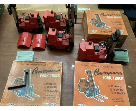Vintage toys; conveyancer fork lift truck selection -some with original boxes and some with backs needing reattaching and a p
