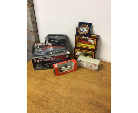 A collection of racing model cars in varying scale. to include remote control BMW 325i M3, Hot Wheels McLaren MP4-15 and two 