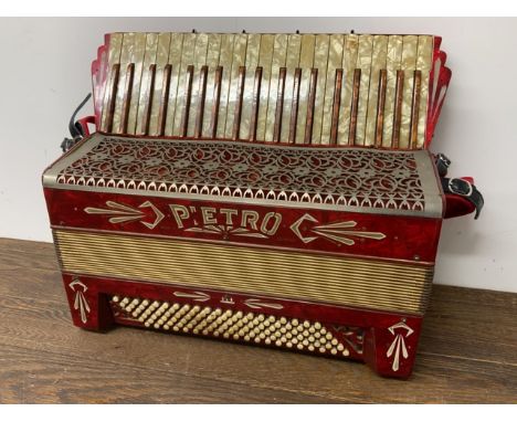 A Vintage German accordion by Pietro in fitted gig bag also with new straps.W:47cm x D:18cm x H:40cm