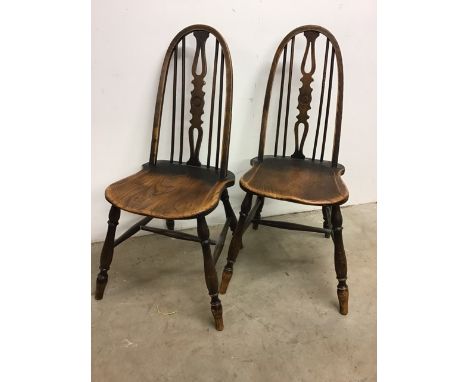 Two Victorian oak stick back country chairs 