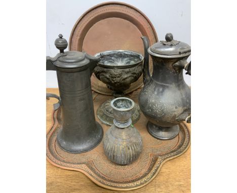 A collection of metalware items to include eastern trays a pewter flask etc.