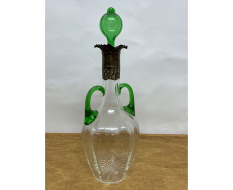 An Deco green and clear glass decanter with silver collar and green glass stopper.&nbsp;William Hatton &amp; Sons Limited, 19