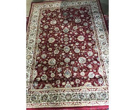 A modern machine woven wool carpet. 230cm x 150cm