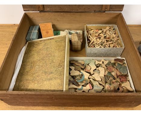 Three antique jigsaw puzzles also with a quantity of old playing cards etc.