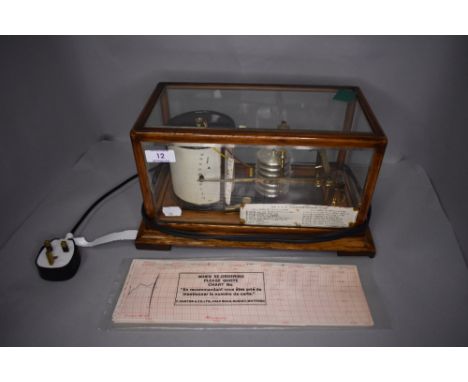 An Edwardian weather station barometer The Cyclo Stormograph in glass case