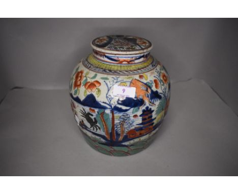 A Chinese hard paste ginger jar with ceramic lid decorated in an imari palette in a Japanese design