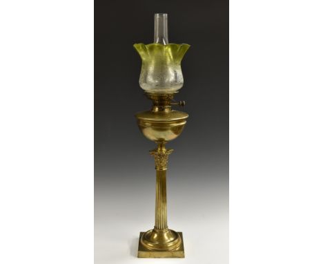 A Victorian brass Corinthian column oil lamp, etched emerald-flashed frilled glass shade, Hinks No.2 Lever burner, square bas