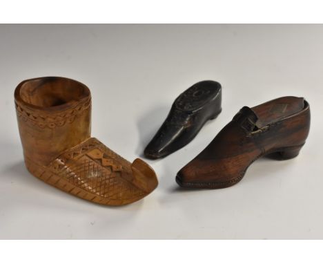 A 19th century novelty rosewood snuff box, as a shoe, the hinged cover with an inset brass kite-shaped lozenge, 9.5cm long, c
