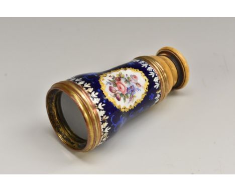 A 19th century enamel monocular, decorated in polychrome with colourful summer flowers on a bleu royale ground, 8.5cm long Co