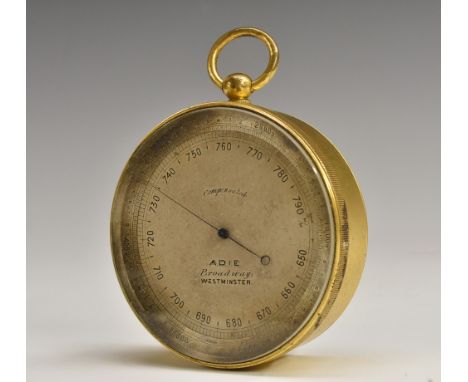 A 19th century gilt brass travelling aneroid barometer, 7cm silvered register inscribed Adie, Broadway, Westminster, 9cm over
