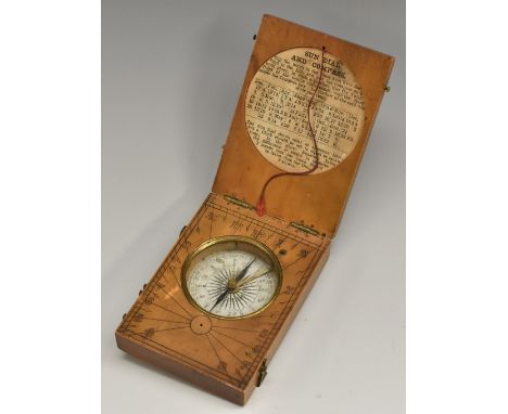 A 19th century boxwood travelling diptych sundial and compass, string gnomon, folding for the pocket, 8cm wide 