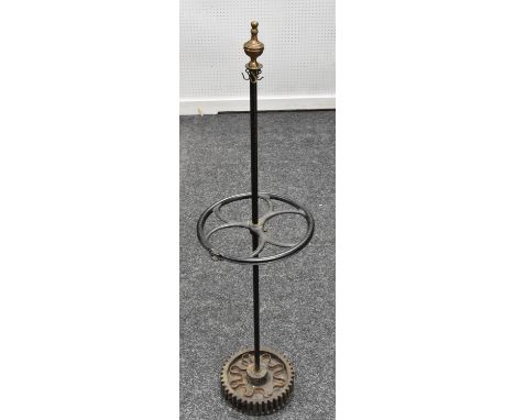 Industrial Salvage - a walking stick stand, incorporating a 19th century pulley and cogs, brass urnular finial, 118cm high