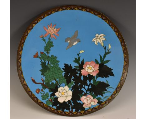 A Japanese cloisonne circular charger, decorated in polychrome with chrysanthemums and a bird, pale blue counter enamel, 30.5