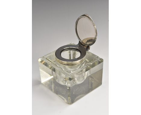 A large Victorian silver mounted clear glass square desk inkwell, hinged cover, 9cm wide, retailed by J C Vickery, Regent Str