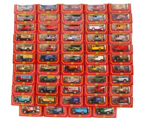 A collection of 50 + assorted Corgi Cameo scale diecast model vehicles with advertisement decals. All appear mint within thei