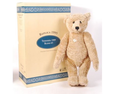 A Steiff made 1995 ' Replica ' teddy bear ' 1909 Blond 65 '. Limited Edition to just 5,000 bears. Blonde mohair with pronounc