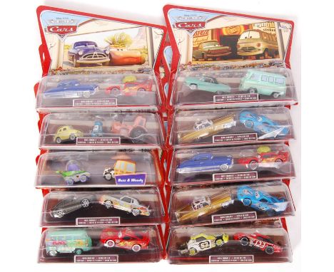 A collection of 10x Mattel made Disney Pixar ' The World Of Cars ' model car ' Movie Moments ' diecast sets. All appear mint,