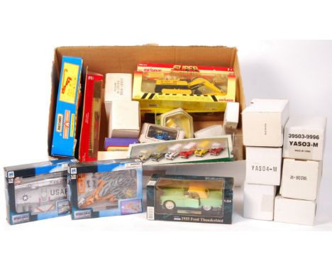 A large collection (approx x30) boxed diecast model cars and vehicles. All appear mint and unused, within their original boxe