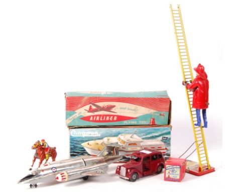 A great collection of vintage toys. Comprising: a charming Marx Toys made tinplate ' The Climbing Fireman ' figure (complete 