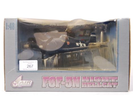 An Air Legends made 1:48 scale precision diecast model aeroplane ' F6F-5N Night Hellcat '. Blue, with pilot figure to cockpit