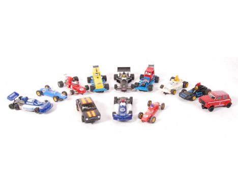 An assorted collection of 12x vintage unboxed Scalextric slot racing cars - to include; Fender Bender, Stick Shifter, Mini Co