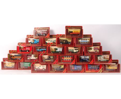 A collection of 30 x assorted Matchbox Models Of Yesteryear 1:43 scale diecast model vehicles. Some advertising interest. All