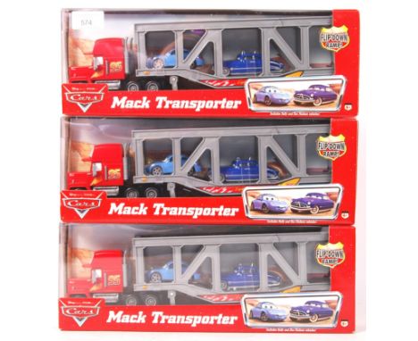 A collection of 3x Mattel made Disney Pixar ' Cars ' diecast model ' Mack Transporter ' lorries / trucks ' Includes Sally And
