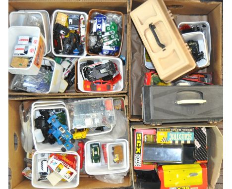 A LARGE collection of assorted vintage Scalextric slot racing car parts and accessories. Comprising of 4x large boxes, and 2x