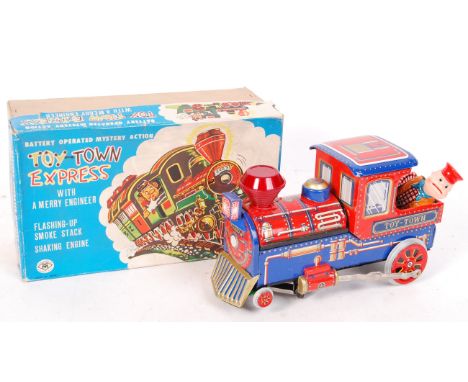 A fabulous vintage 1960's Japanese made Modern Toy Co. ' Toy Town Express ' battery operated tinplate railway locomotive. ' W