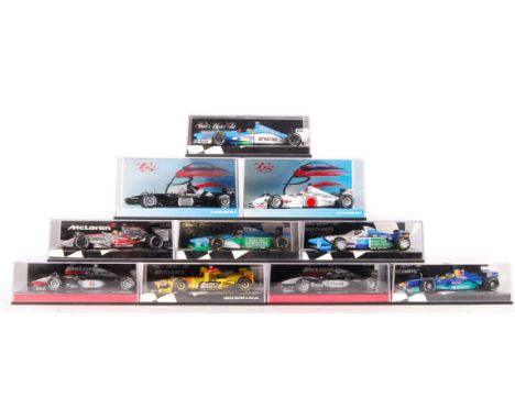 A collection of 10x Minichamps made 1:43 scale precision diecast model Formula One racing cars. All appear mint, unused, with