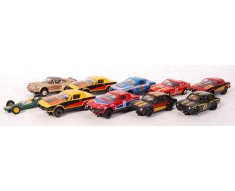 A collection of 10x assorted vintage Scalextric slot racing cars - largely 1980's - to include; Ford Escort, TR7's, Porsche, 
