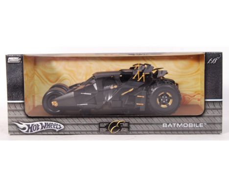 A Hot Wheels made Exclusive 1:18 scale Batman ' Batmobile ' ( The Tumbler ) precision diecast model. Extremely well detailed.