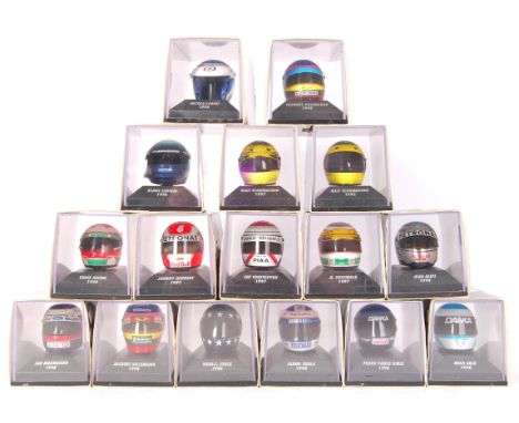 A collection of 16 x assorted Paul's Model Art Minichamps 1:8 scale diecast Helmet collection to include: Jan Magnussen 1998,