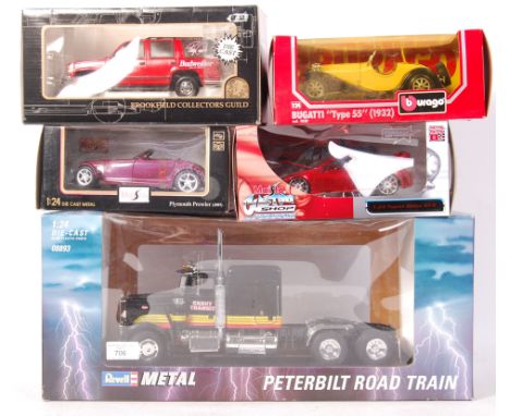 A collection of 5x large scale boxed diecast models. Comprising: a Revell Metal 1:24 scale Peterbilt Road Train 08893, a Mais