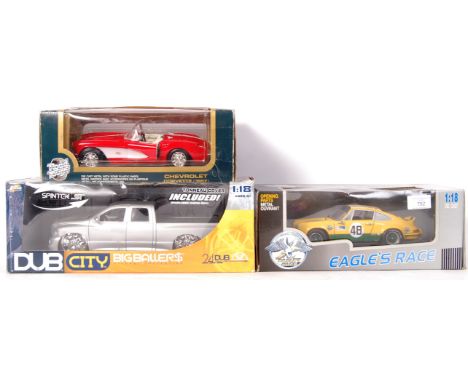 A collection of 3 x assorted 1:18 scale precision diecast model vehicles to include; Road Tough ' Chevrolet Corvette (1957), 