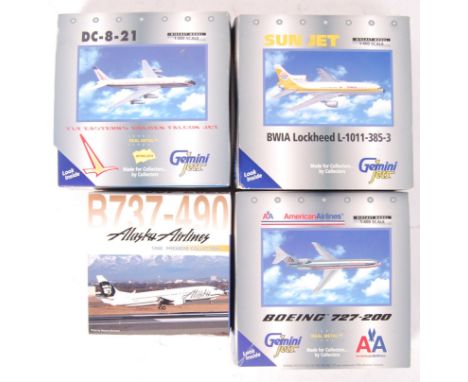 A good collection of 4x boxed miniature diecast model aeroplanes. Comprising: a Dragon Wings 55167 Alaska Airlines plane, and