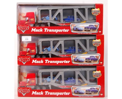 A collection of 3x Mattel made Disney Pixar ' Cars ' diecast model ' Mack Transporter ' lorries / trucks ' Includes Sally And