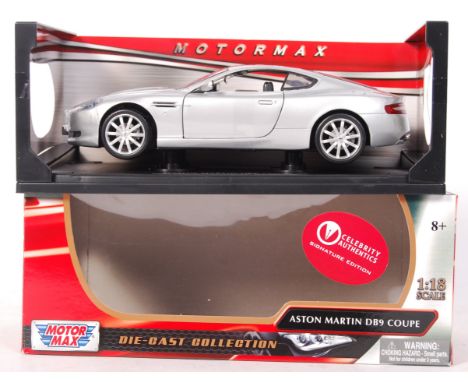 A rare Celebrity Authentics ' Signature Edition ' signed James Bond 007 1:18 scale Aston Martin DB9 Coupe. Signed to the top 