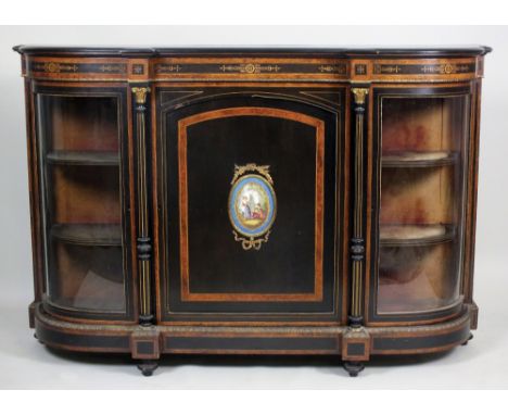 A Victorian ebonised walnut cross banded and inlaid and gilt metal mounted credenza, third quarter 19th century, the rectangu