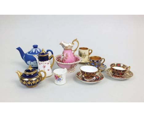 A collection of miniature porcelain to include a Coalport coffee pot and cover, red enamel mark, M6455, 6.5cm, Staffordshire 