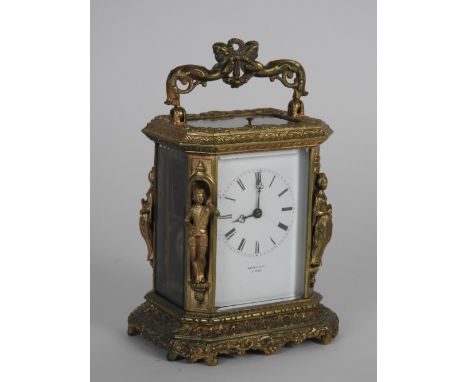 A French cast gilt brass carriage clock with push button repeat, retailed by Henry & Co, Paris, third quarter 19th century, t