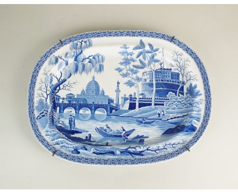 A blue and white pearl ware meat plate, early 19th century, probably Spode, printed with the Tiber pattern, the view of the T