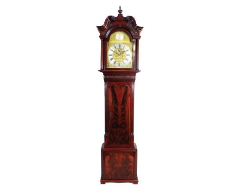 A George III mahogany longcase clock, late 18th century, the arched hood with broken scroll swan neck pediment centred by a r