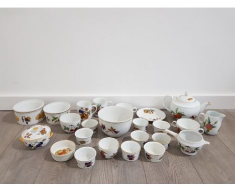 Large collection of Royal worcester evesham porcelain includes tea pot, milk jug, lidded pot and cups etc
