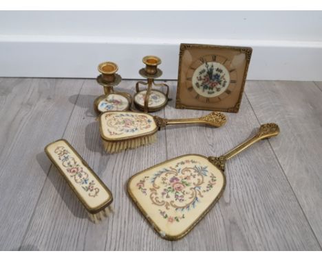 Petite point dressing table set comprising 2 brushes, a mirror candlesticks and matching clock etc