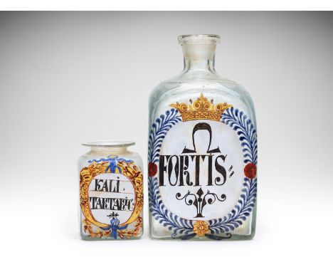 TWO PHARMACY/APOTHECARY/MEDICAL JARS | GERMANY | 18th century | 9. 19 cm (height) | Glass, painted enamel labels | Provenance